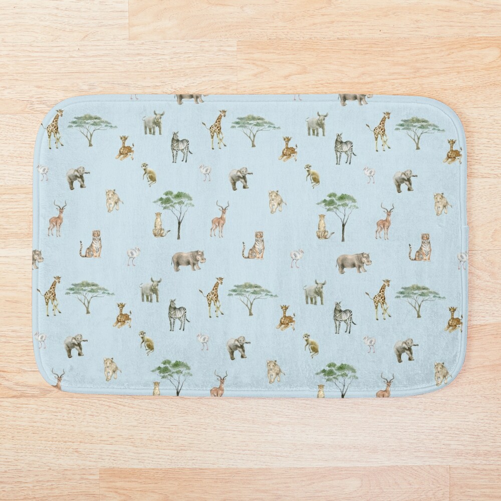 A repeating print with safari animals and trees on a light blue background
